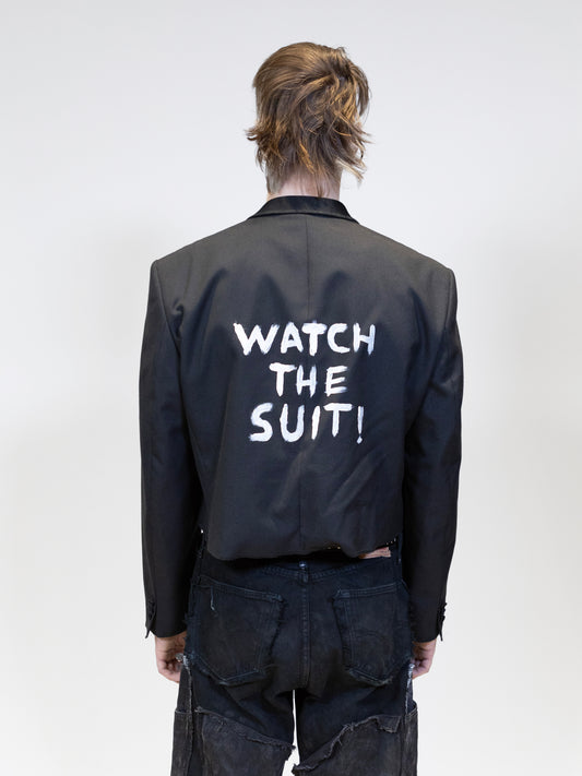 black cropped blazer on a male model from the back