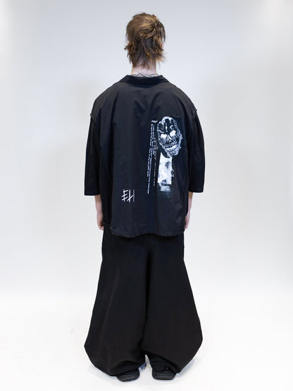 fullbody picture of a male model wearing eli nikkabokka pants and elieffekt double shirt from the back