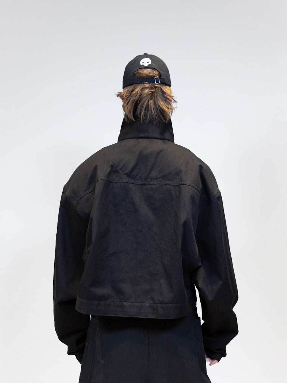 male model wearing eli windshield jacket from the back