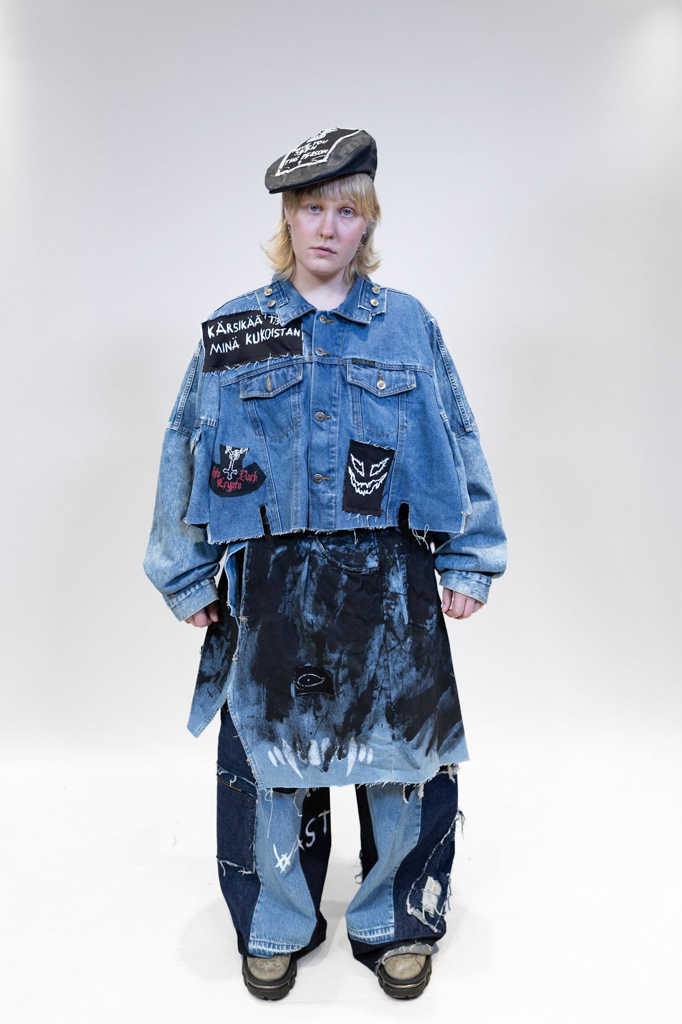 female model wearing wraparound denim skirt with full denim outfit