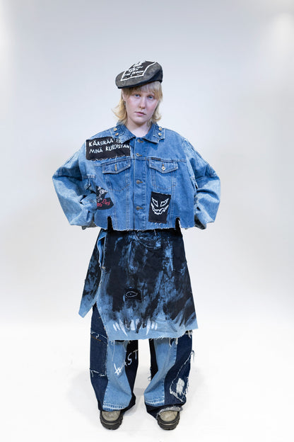 female model wearing full denim outfit with wraparound skirt