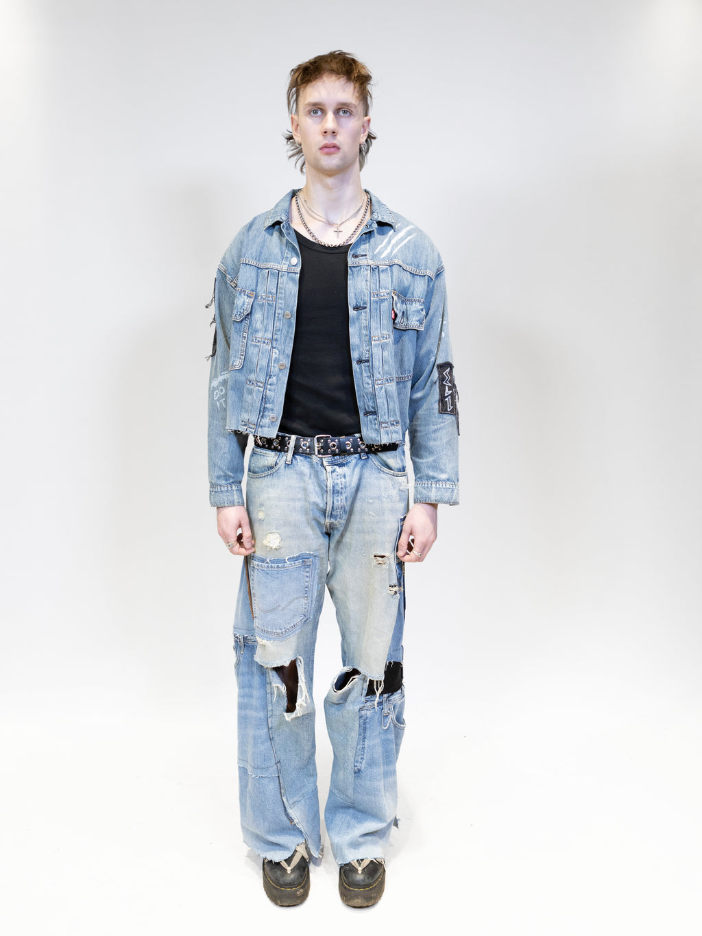 full body picture of a male model wearing elieffekt originals denim jacket with jeans