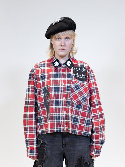 female model wearing red checkered flannel collar shirt from the front